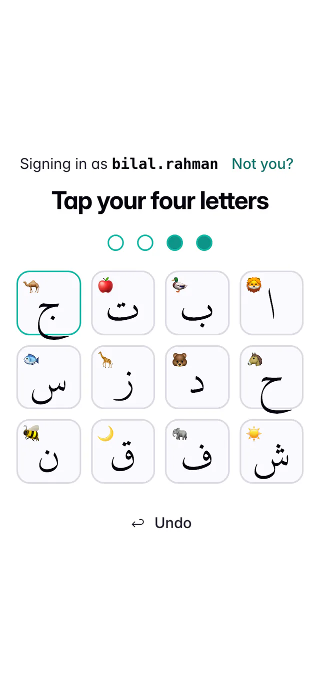 A phone showing Signing in as bilal.rahman with a Not you? link, the heading Tap your four letters, four dots with two filled in, a grid of twelve Arabic letter tiles each with a small picture, and an Undo button.